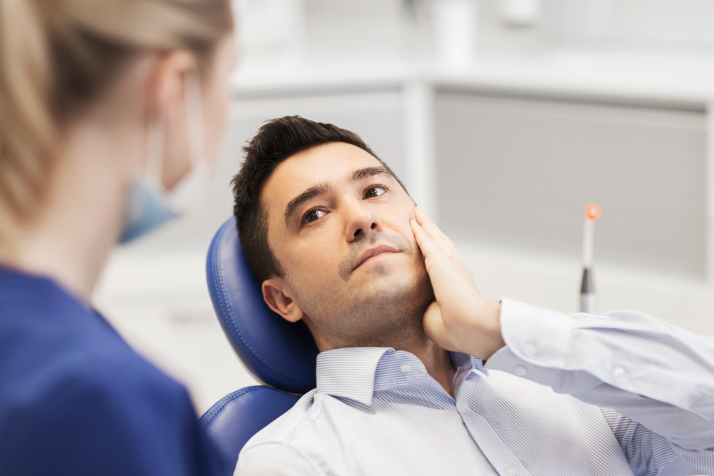 Surgical Tooth Extraction Dr. Fortinos at Orange California